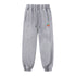 Gray sweatpants with geometric design and colorful logo on a white background