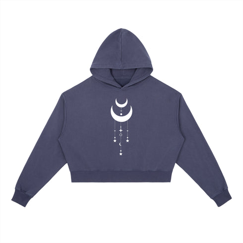Navy blue hoodie with a white moon and star design on a white background