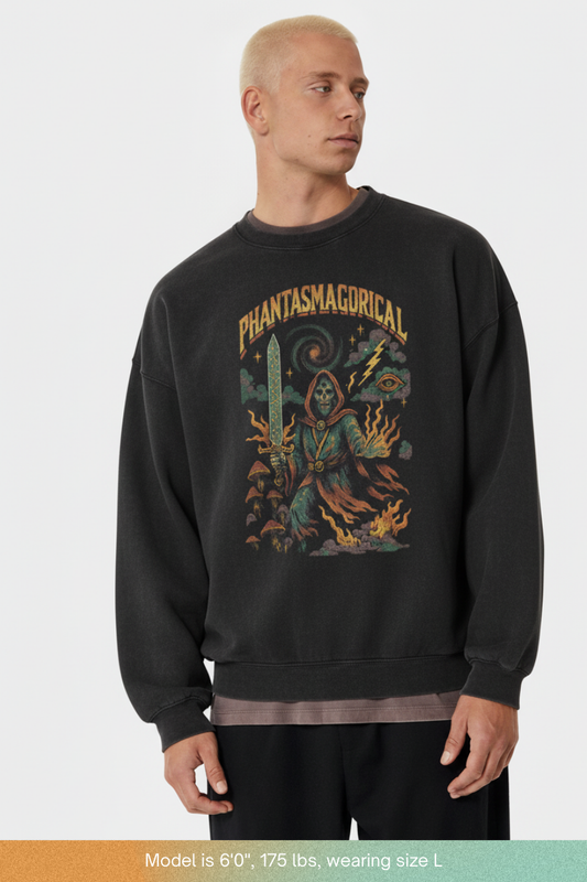 Person wearing a black sweatshirt with a colorful graphic design on a white background