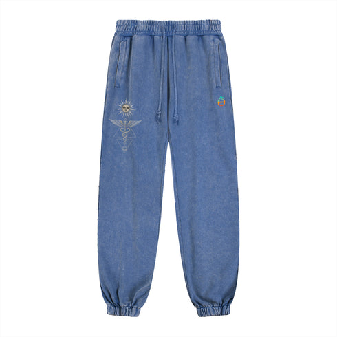 Inner Alchemy snow wash heavyweight jogger sweatpants with psychedelic esoteric graphic design in blue vintage denim