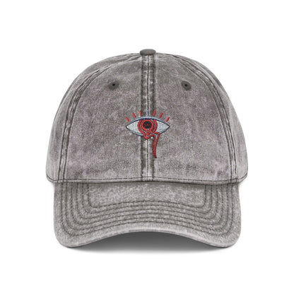 Gray cap with an embroidered design on a white background