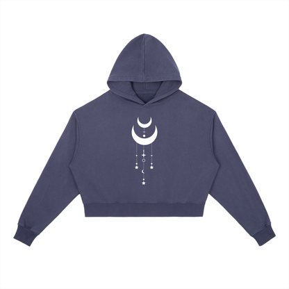 Navy blue hoodie with a white moon and star design on a white background