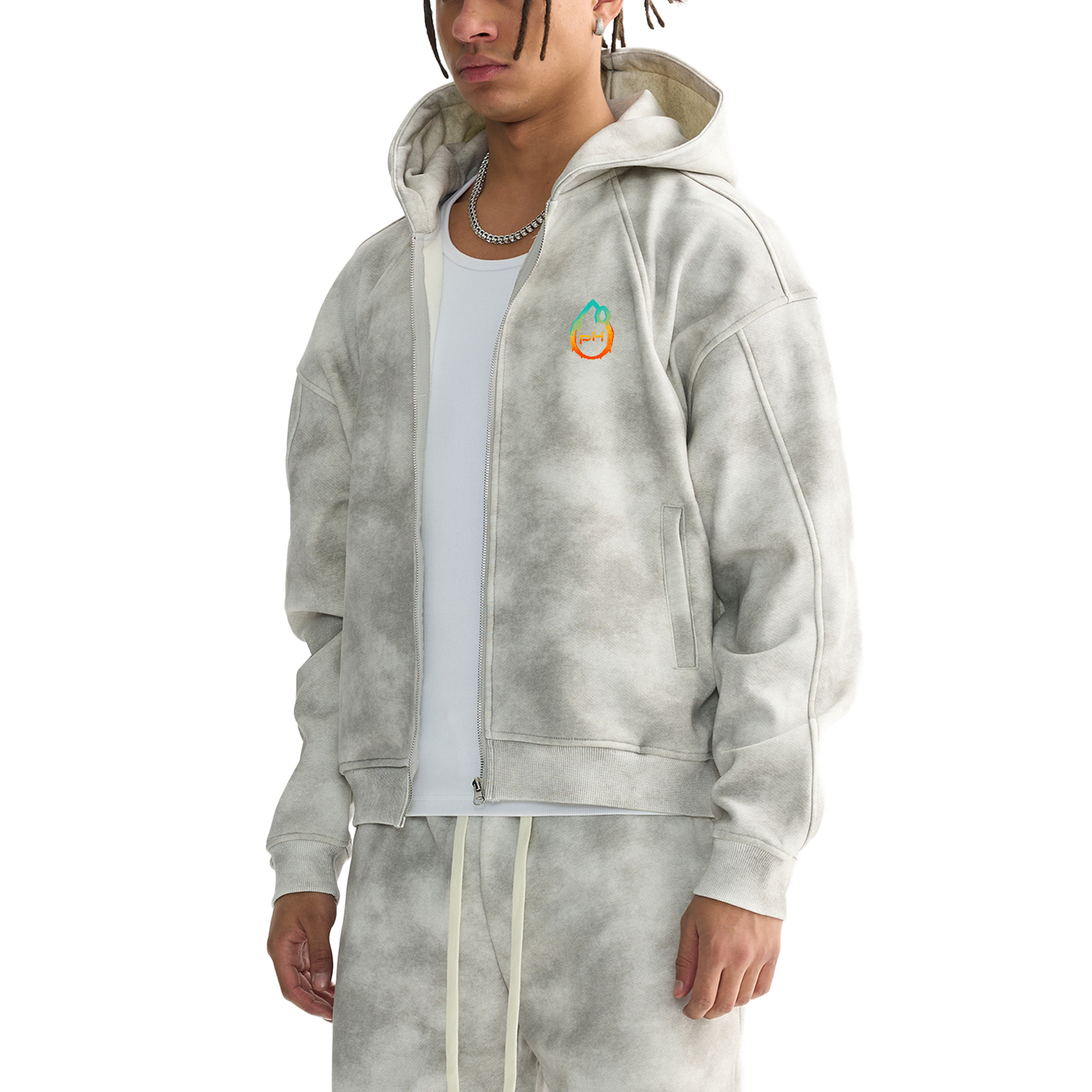 Person wearing a gray tie-dye hoodie with a logo on a white background