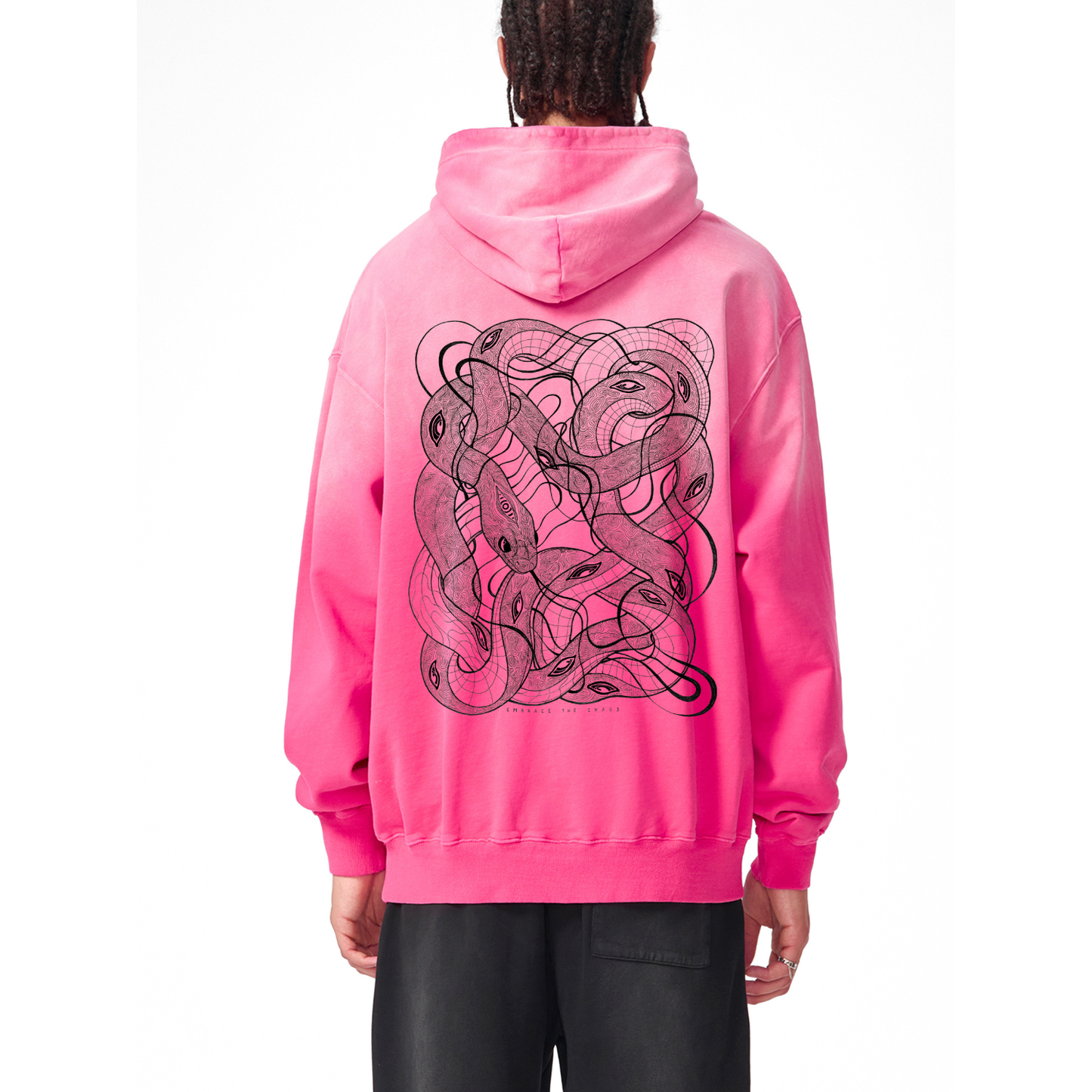 Person wearing a pink hoodie with the "Embrace The Chaos" snake design on the back