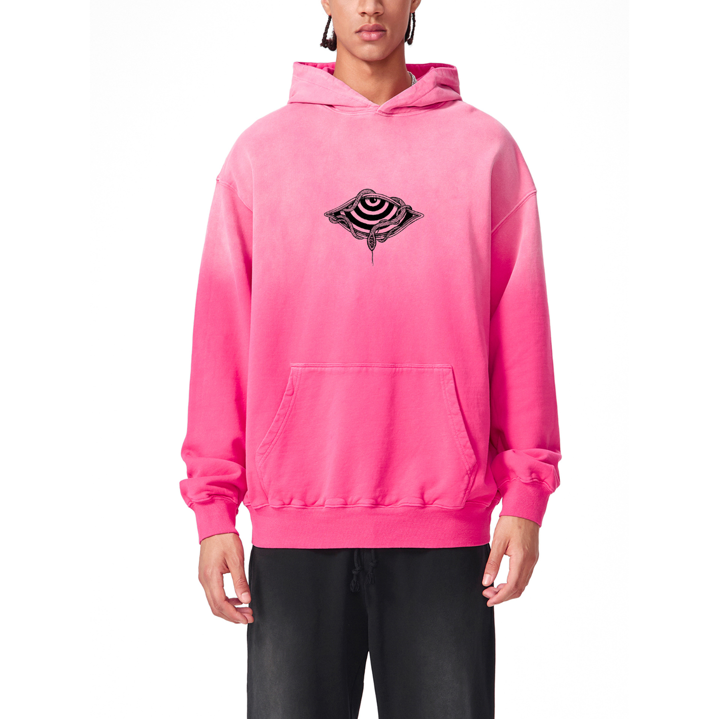 Person wearing a pink hoodie with a black and white design on a white background