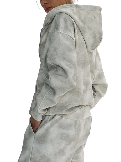 Gray hoodie and pants set on a white background